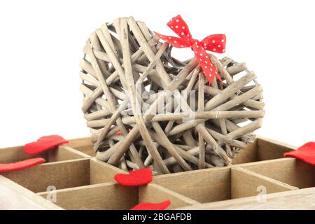 Heart in wooden casket, isolated  on white background Stock Photo