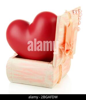 Heart in wooden casket, isolated  on white background Stock Photo