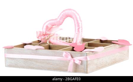 Heart in wooden casket, isolated  on white background Stock Photo