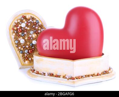 Heart in wooden casket, isolated  on white background Stock Photo