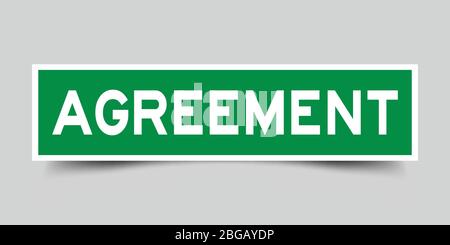 Label sticker green color in word agreement on gray background Stock Vector