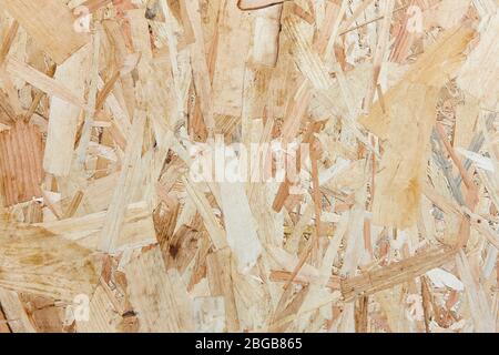 Textured compressed wooden panel detail background. Recycled material. Timber Stock Photo