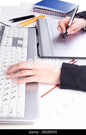 Female hand using graphics tablet on table close up Stock Photo