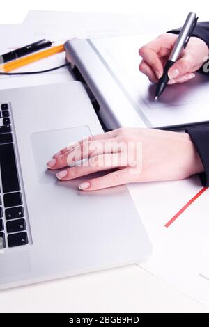 Female hand using graphics tablet on table close up Stock Photo