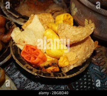 wafer, crispy, chips, papad, snack served in disposable plate made from dry leaf pure villagers style delicious street food Stock Photo