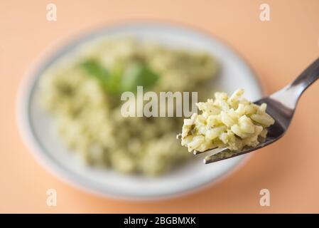 Rice with basil pesto sauce Stock Photo