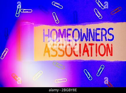 Handwriting text writing Homeowners Association. Conceptual photo Organization with fee for upkeeps of Gated Community Stock Photo