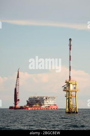 accommodation work boat or AWB anchorage at oil field for oil platform maintenance