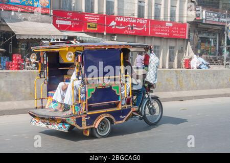 Everyday life in Lahore, Pakistan, with crowded streets, donkeys ...