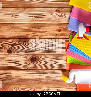 Colorful cleaning set for different surfaces in kitchen, bathroom and other rooms. Cleaning service concept Stock Photo