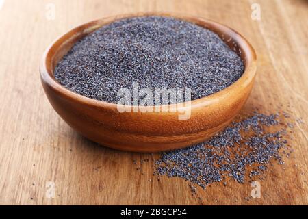 Poppy seeds in bowl on table close-up Stock Photo