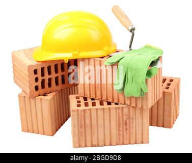 New bricks and building tools, isolated on white Stock Photo