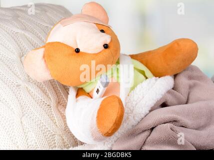 Sick bear in bed close-up Stock Photo