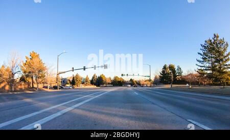 Driving on typical paved roads in suburban America. Stock Photo