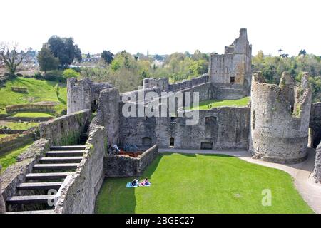 Two females having picnic in grounds of Chepstow castle Stock Photo