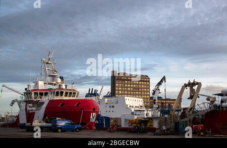 London, UK. 14th Oct, 2019. File photo taken on Oct. 14, 2019 shows a port in Aberdeen, Scotland, Britain. Brent crude plummeted to 22 U.S. dollars a barrel at one point Tuesday morning as global oil demand collapses because of lockdown in many countries to tackle the coronavirus pandemic. Credit: Han Yan/Xinhua/Alamy Live News Stock Photo