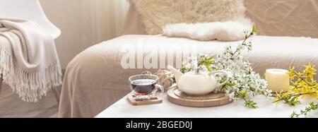 Composition with spring flowers in the interior. Stock Photo