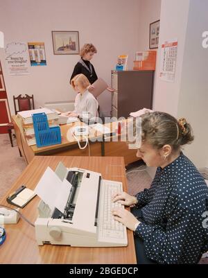 1990, workers in a typical office of the time, UK Stock Photo