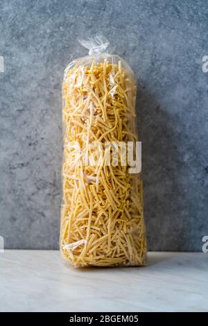Homemade Raw Turkish Eriste Noodle Pasta in Package Ready for Sale. Organic Product. Stock Photo