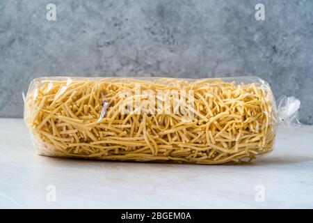 Homemade Raw Turkish Eriste Noodle Pasta in Package Ready for Sale. Organic Product. Stock Photo