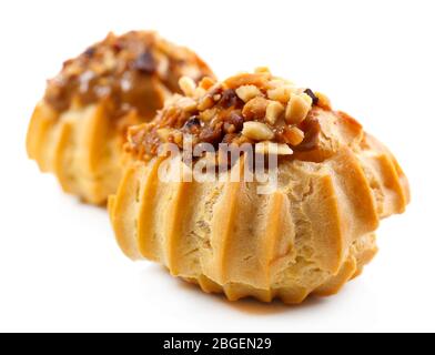 Tasty cakes isolated on white Stock Photo