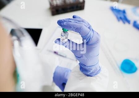 High angle view of hands holding the cure Stock Photo