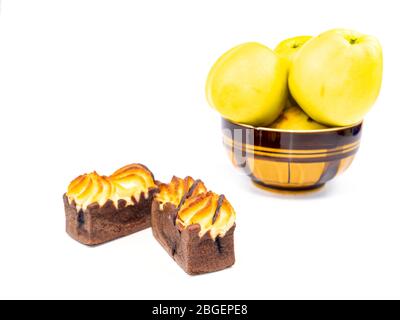 Cake and apples in a plate on a white background. Stock Photo