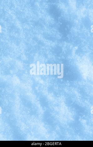 Snow texture in blue tone. Texture of white snow. Winter background with snow drifts Stock Photo
