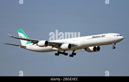 EP-MMQ Iranian Mahan Air Airbus A340-642 at Malpensa (MXP / LIMC), Milan, Italy Stock Photo