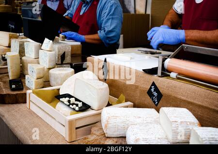 traditional hard cheese on a market stall in Italy Stock Photo