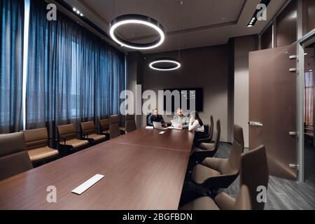 Group of business people having a discussion in conference room Stock Photo