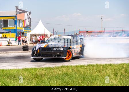 Plovdiv, Bulgaria - May 3, 2015: Drift of Bulgaria. Challenge Battle BMW Turbo E36 with M power Engine. Full throttle drifting. Front view of one of t Stock Photo