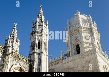 The Jeronimos monastery in Belem, Lisbon, best example of late gothic manueline architecture in Portugal. Detail of bell tower and dome of the Santa M