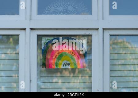 Rainbow paintings showing support and thanks for the NHS in the windows of homes in Ealing, London. Photo date: Sunday, April 19, 2020. Photo: Roger G Stock Photo