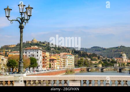 View of the Adige river from Ponte della Vittoria bridge in Verona, Italy. Stock Photo