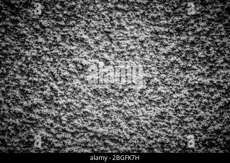 Gray stucco old wall background. Decorative architecture backdrop. Retro cement dark texture. Vintage exterior wallpaper Stock Photo