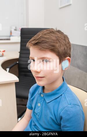 Process of making a custom earplug for a boy. Stages of manufacturing earplugs. doctor makes custom molded ear plugs for the patient Stock Photo