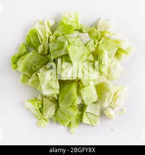 cutted piece, cutting board, whole head, sliced fresh, shredded cabbage Stock Photo