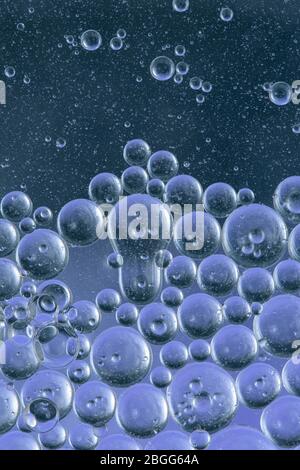 Colored air bubbles in water Stock Photo