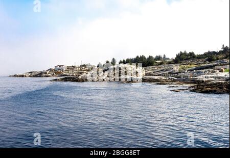 Tananger coastline at Jasund peninsula and Sjobadet Myklebust public swimming area, Tananger, Norway, May 2018 Stock Photo