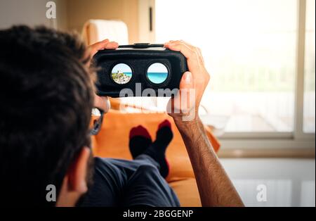 Man using VR headset and doing Virtual reality travel Stock Photo