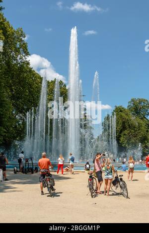 People watching the musical fountain show on Margaret Island Stock Photo