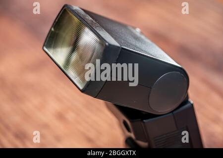 Norwich, Norfolk, UK – April 19 2020. Close up and selective focus on a Canon manual flash gun Stock Photo