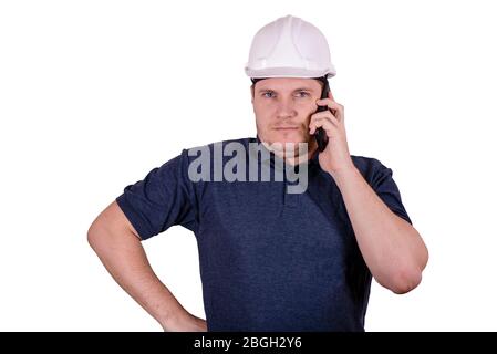 white male engineer in a white hard hat Stock Photo