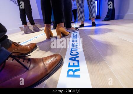 People doing an activity of group dynamics during networking at their company Stock Photo