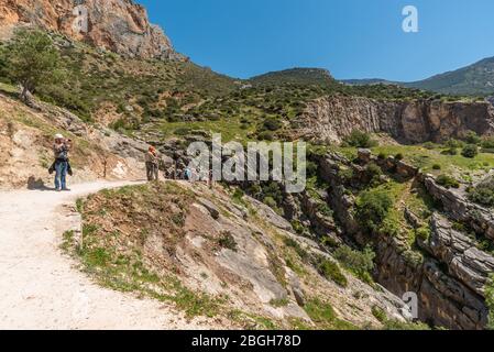 April 17, 2018 - El Chorro, Spain. About 1,6 km of the 3 km long popular path, Caminito del Rey, consists of gravel. Stock Photo