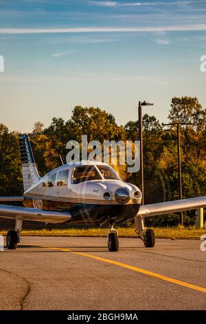 A Piper Archer III taxis by at the Habersham County Airport. Stock Photo