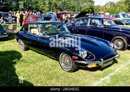 Westbury, Wiltshire / UK - September 1 2019: A 1969 Jaguar E-Type Series 2 (HHW 299G) sports car at the White Horse Classic & Vintage Vehicle Show Stock Photo