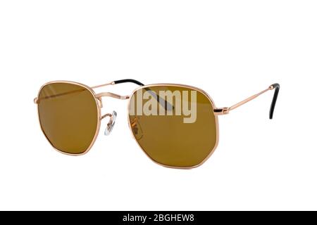 Square shape, wrap around gold frames brown color sunglasses isolated on white background. Side view. Stock Photo