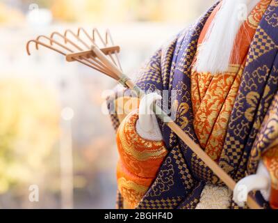 GOMEL, BELARUS - APRIL 20, 2020: The Antique Kimekomi Japanese doll old man Jo depicting a Noh play, 'The Old Couple from Takasago'. Stock Photo